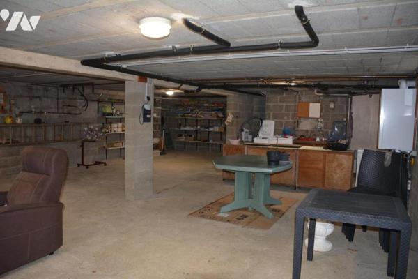 Vente sur la commune de Vaiges maison d'habitation avec garage et jardin