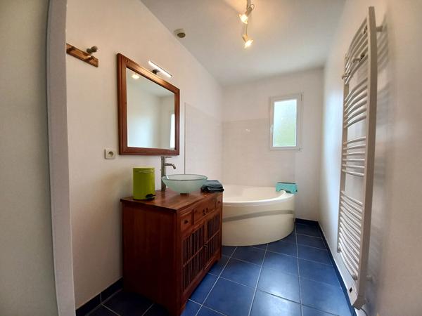 À découvrir : maison 4 chambres avec terrasse et climatisation réversible