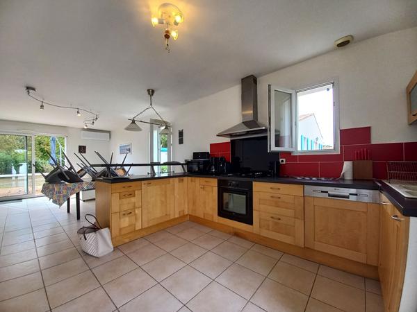 À découvrir : maison 4 chambres avec terrasse et climatisation réversible