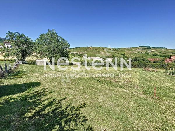 Terrain Constructible de 1300 m² environ - 69840 JULIENAS