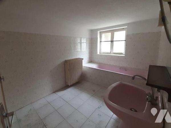 Maison 4 pièces à vendre à EVELLYS-NAIZIN (56500), Morbihan (56), situé dans le centre-ville de...