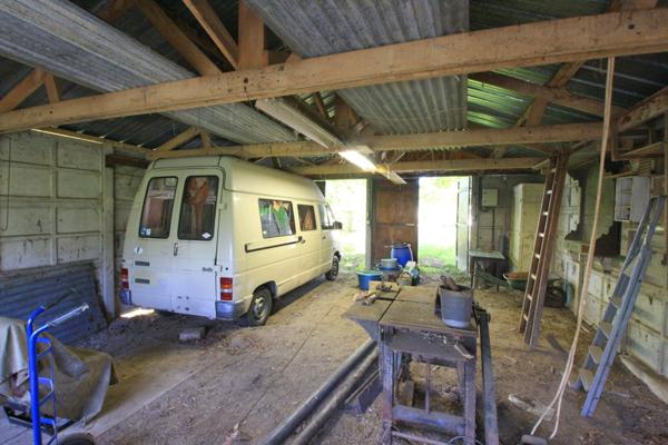 Maison 165 m² avec dépendances et puits.