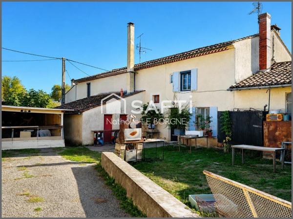 Ensemble immobilier : 2 maisons / hangars /annexes