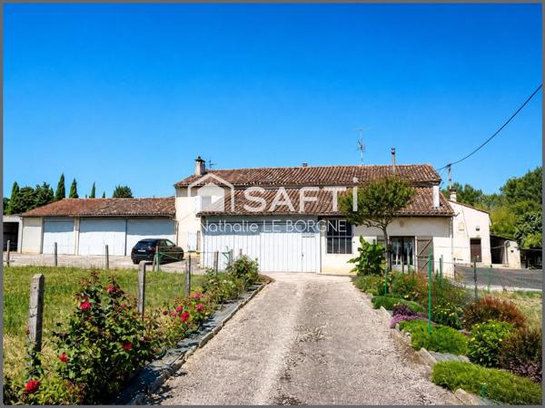 Ensemble immobilier : 2 maisons / hangars /annexes