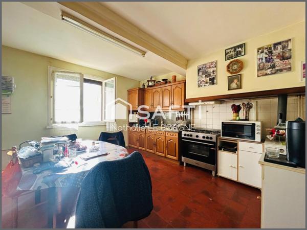 Ensemble immobilier : 2 maisons / hangars /annexes