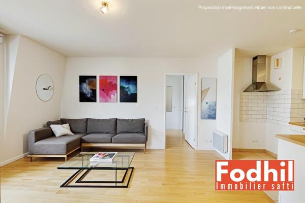Appartement 2 pièces de 42 m² au dernier étage avec parking privé
