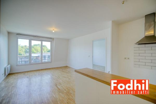 Appartement 2 pièces de 42 m² au dernier étage avec parking privé