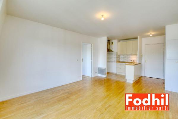 Appartement 2 pièces de 42 m² au dernier étage avec parking privé