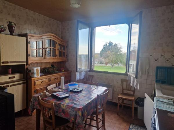 Belle maison avec sous-sol et terrain