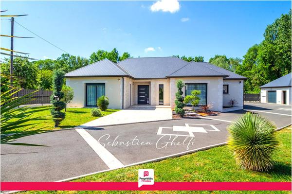 belle maison de plain-pied avec 3 chambres-cellier-grand garage-beau terrain