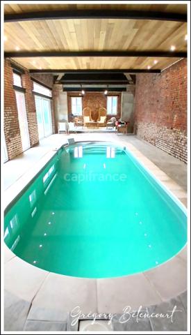 Maison bourgeoise 190 m2 avec piscine intérieure chauffée, garages et dépendances