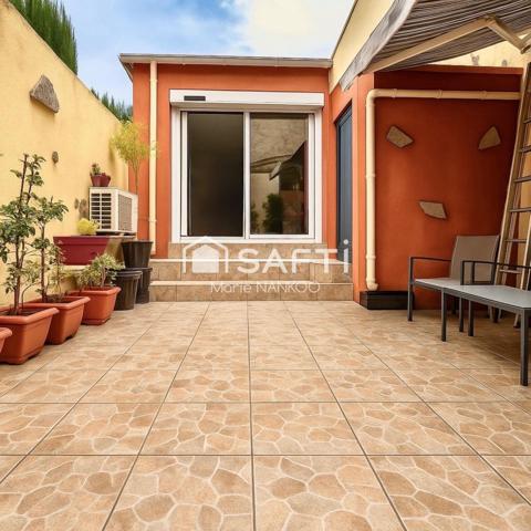 Offrez-vous le charme d'une maison conviviale et pleine de caractère, à deux pas de Carcassonne, avec toit terrasse et cour privative – l’équilibre parfait entre confort, tranquillité et accessibilité !