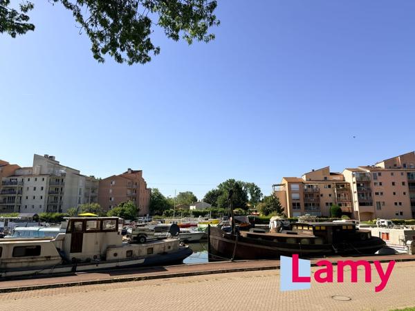 Appartement + stationnement sous-sol