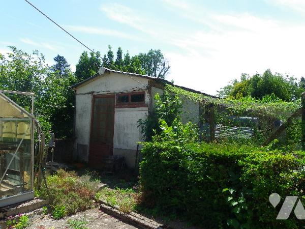 Maison de 112 m² hab env de 3 chambres située proche de toutes commodités.