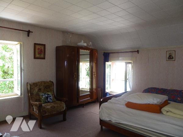 Maison de 112 m² hab env de 3 chambres située proche de toutes commodités.