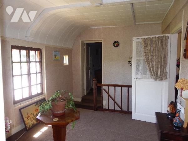 Maison de 112 m² hab env de 3 chambres située proche de toutes commodités.