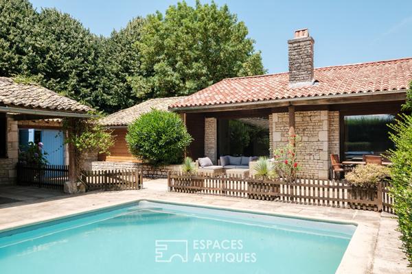 Propriété avec piscine à fort potentiel en pleine nature