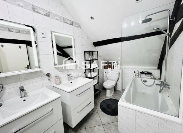 Appartement T4 en duplex avec cave et 2 places de parking privatives