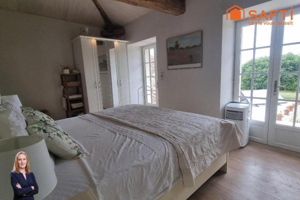 Charme et élégance rurale aux portes d’un village classé