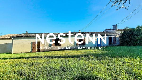 Maison 105 m² à rénover avec 3 chambres, garage et jardin à Réaup-Lisse