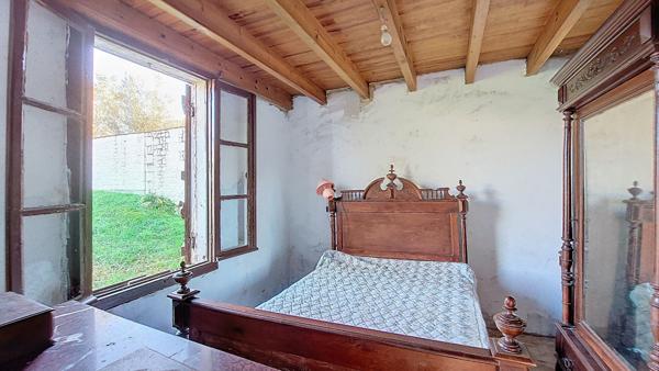 Maison 105 m² à rénover avec 3 chambres, garage et jardin à Réaup-Lisse