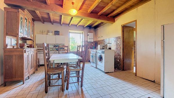 Maison 105 m² à rénover avec 3 chambres, garage et jardin à Réaup-Lisse