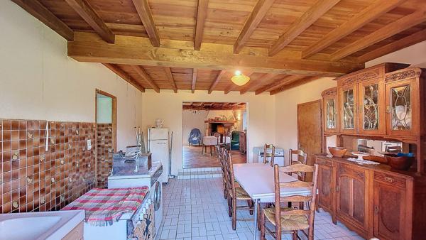 Maison 105 m² à rénover avec 3 chambres, garage et jardin à Réaup-Lisse