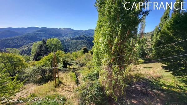 Sud-Est de la France, dans un cadre magnifique, en Ardèche magnifique maison en pierres de 320m² habitables sur 4500m² de terrain - Piscine - Exposition sud et Belle Vue dégagée