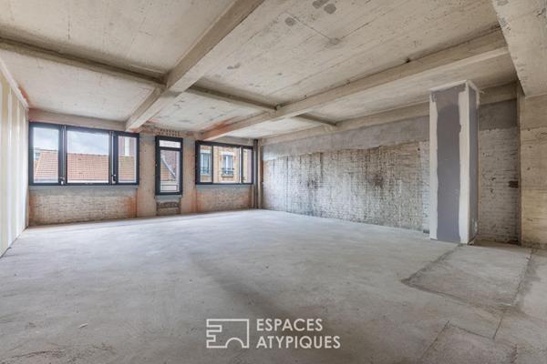 Loft industriel brut à aménager