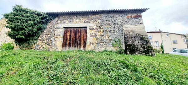 GARAGE DOUBLE AVEC TERRAIN COEUR DE VILLAGE