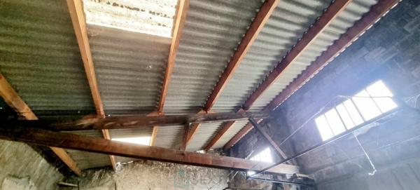 GARAGE DOUBLE AVEC TERRAIN COEUR DE VILLAGE