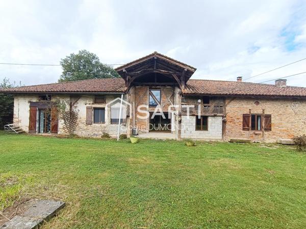 Joli corps de ferme en partie rénové d'une surface habitable de 168 m2 sur terrain attenant de 6476 m2