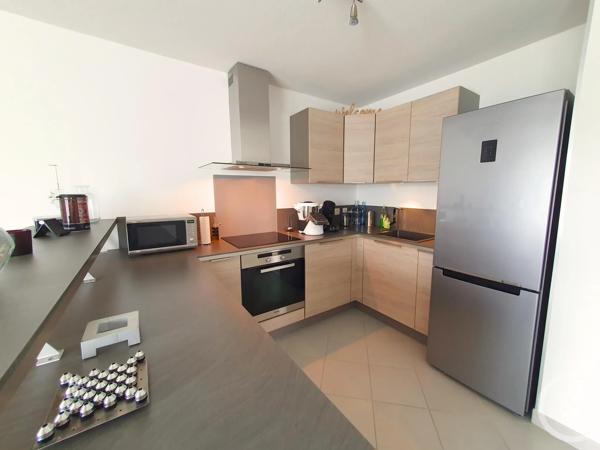 Appartement F3 à vendre  3 pièces - 60,84 m 2   RUMILLY  - 74
