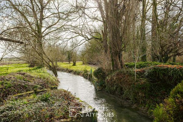Ancien moulin aux maisons de charme et ses dépendances