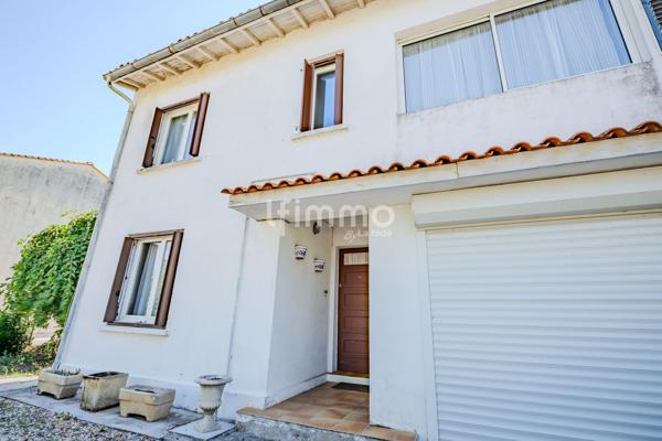 Maison familiale avec jardin et garage