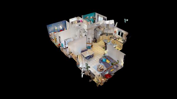 Maison de plain-pied avec jardin arboré et garage à Carcassonne.