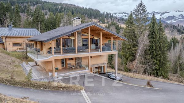 Chalet d’Exception à Combloux – Vue Panoramique & Prestations Haut de Gamme