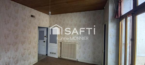 Très proche du centre-ville un appartement, garages et dépendances