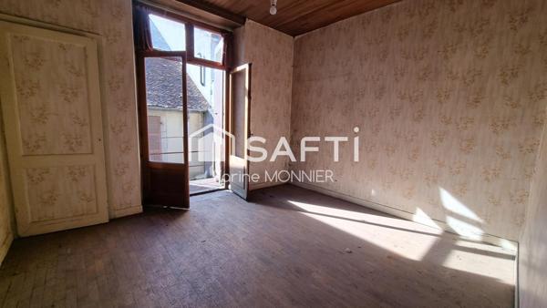 Très proche du centre-ville un appartement, garages et dépendances