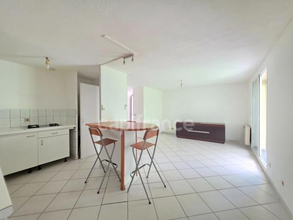 Charmante maison de plain-pied de 71 m² avec véranda, garage, jardin et panneaux photovoltaïques