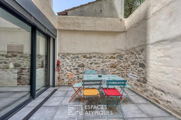 Appartement type loft avec patio