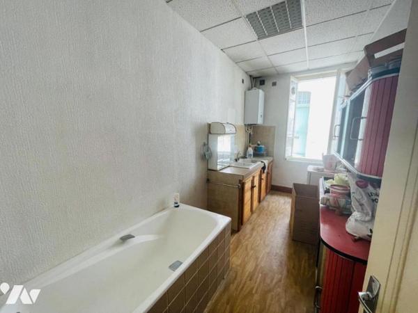 MAISON DE VILLE AVEC TERRASSE ET GARAGE