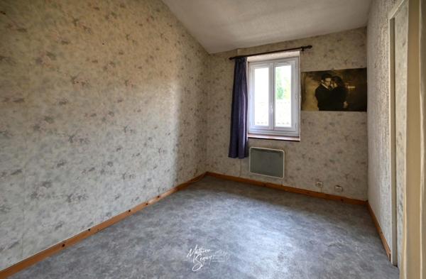 SAINT GENIS LAVAL - Maison de village avec courette et grand garage