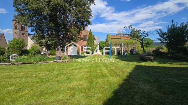 Elégante maison au calme avec vaste jardin arboré