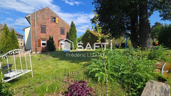 Elégante maison au calme avec vaste jardin arboré