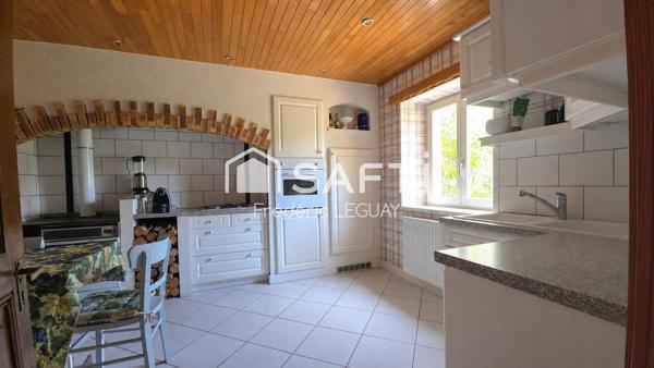 Elégante maison au calme avec vaste jardin arboré