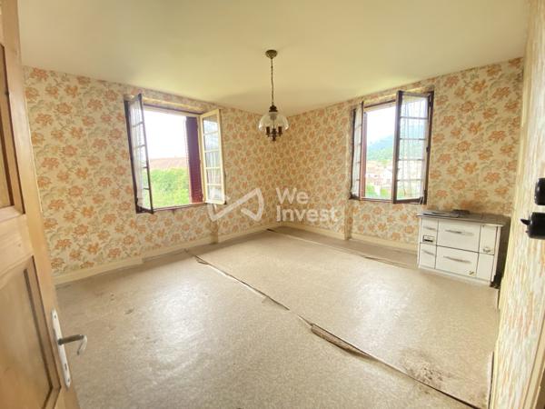 Bâtisse composée de 2 logements T3 de 65 m² chacun à Champfromier