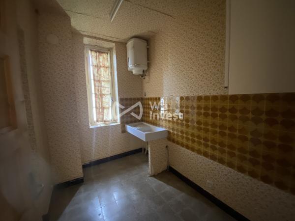 Bâtisse composée de 2 logements T3 de 65 m² chacun à Champfromier