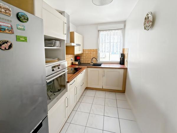 COEUR DE VILLE Appartement F3 de 67 m2 avec terrasse de 9 m2, 1 place de parking en sous-sol sol