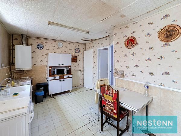 Vente d'une maison en pierres à rénover avec grenier aménageable dans le Bourg de Meslin